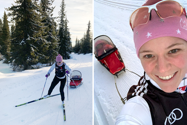 Miriam Neureuther und ihr Kind beim Skifahren mit Skianhänger.